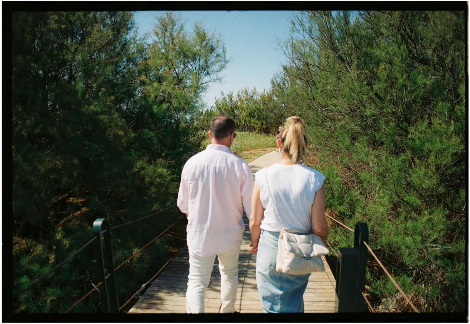 Two people walking side by side on a quiet path, a visual metaphor for gradually building a new relationship