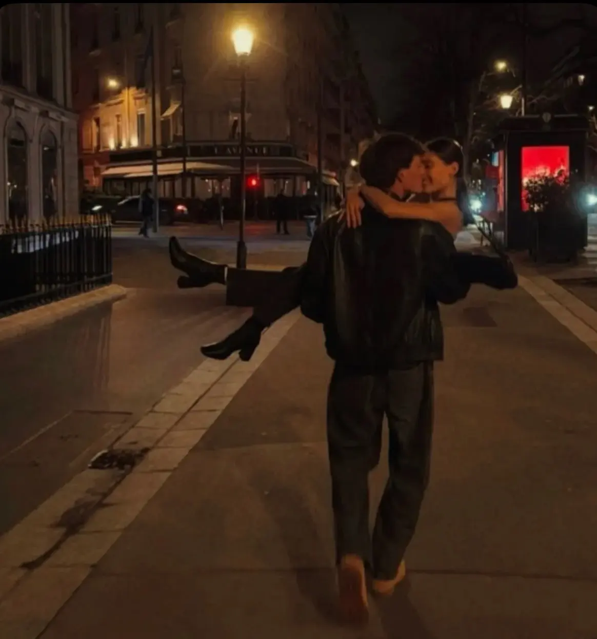 May-December relationship: a couple walking together through a city at night