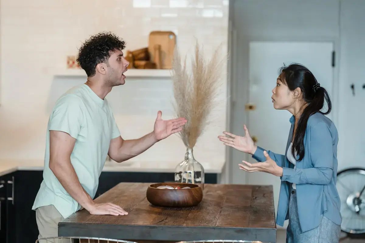 Pet peeves in relationships: a kitchen disagreement that may be a small annoyance, communication issue, or red flag