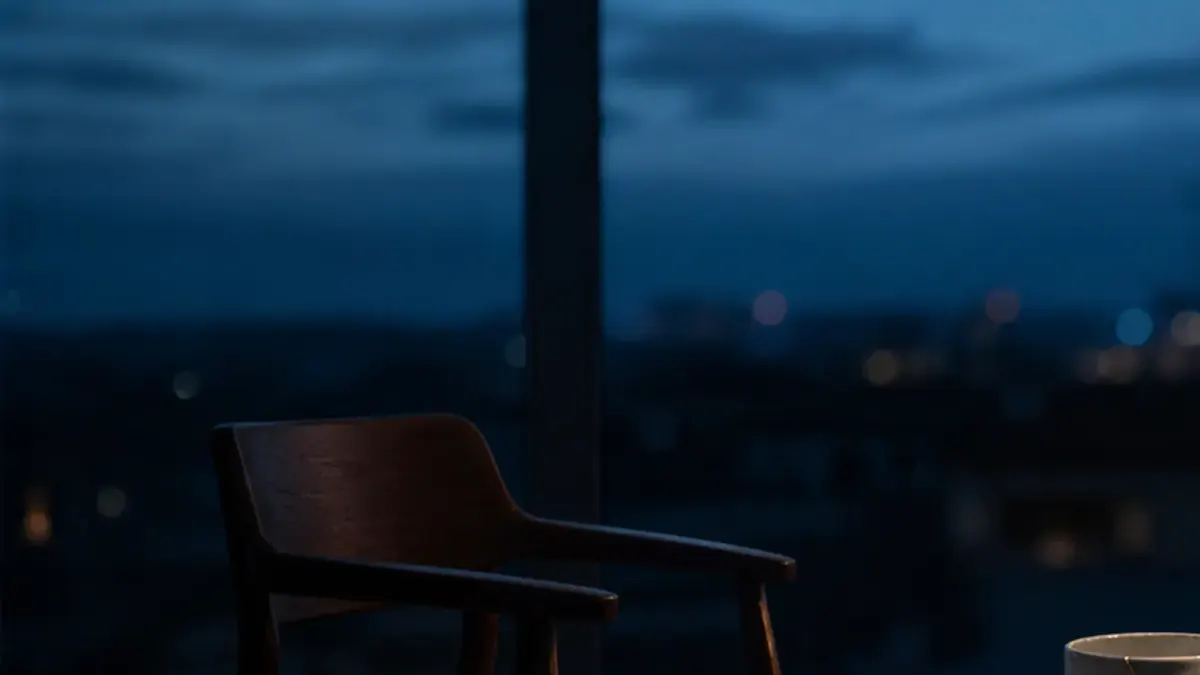 Two empty chairs near a window, suggesting quiet emotional distance before reconnection