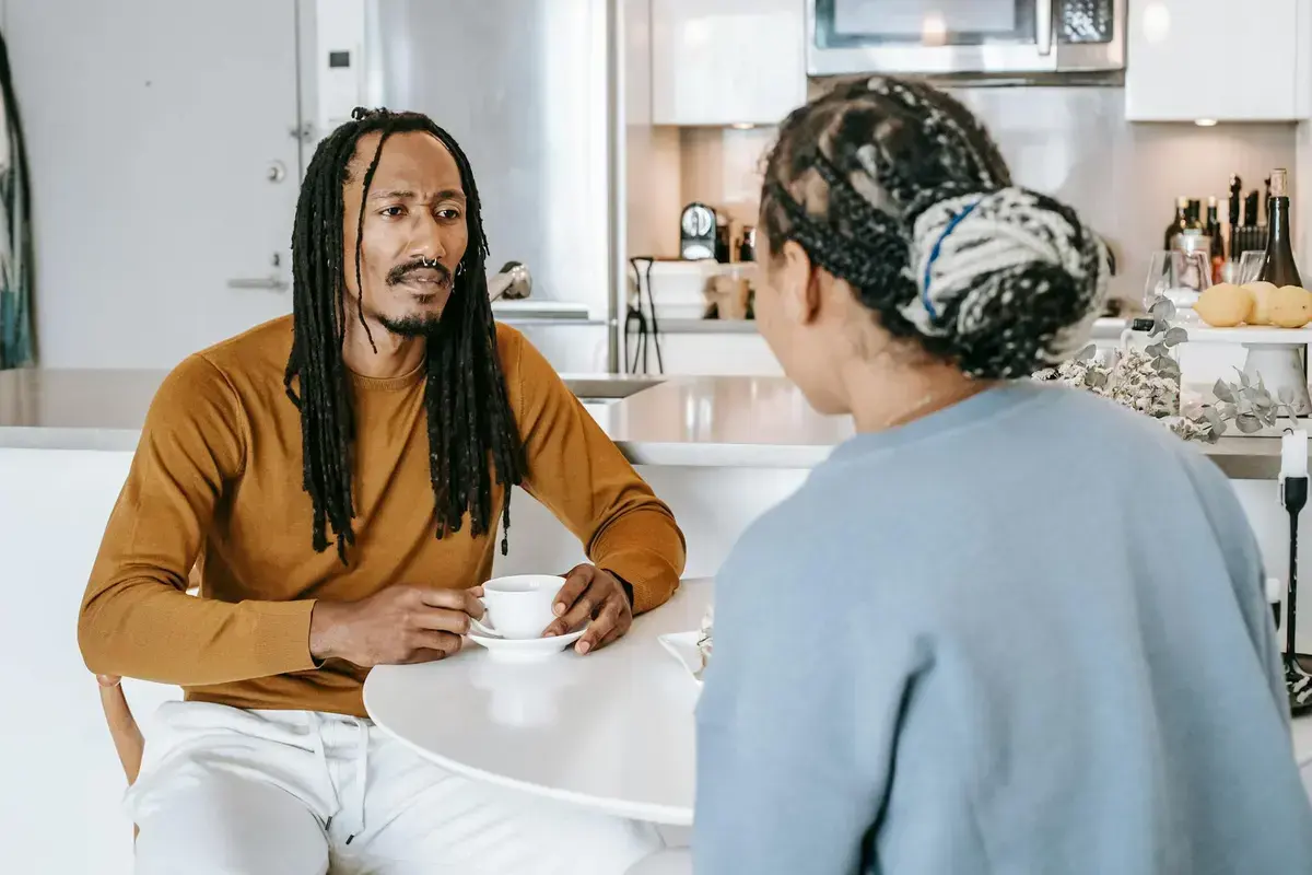 What Changes From Talking Stage to Dating: calm table conversation about clarity