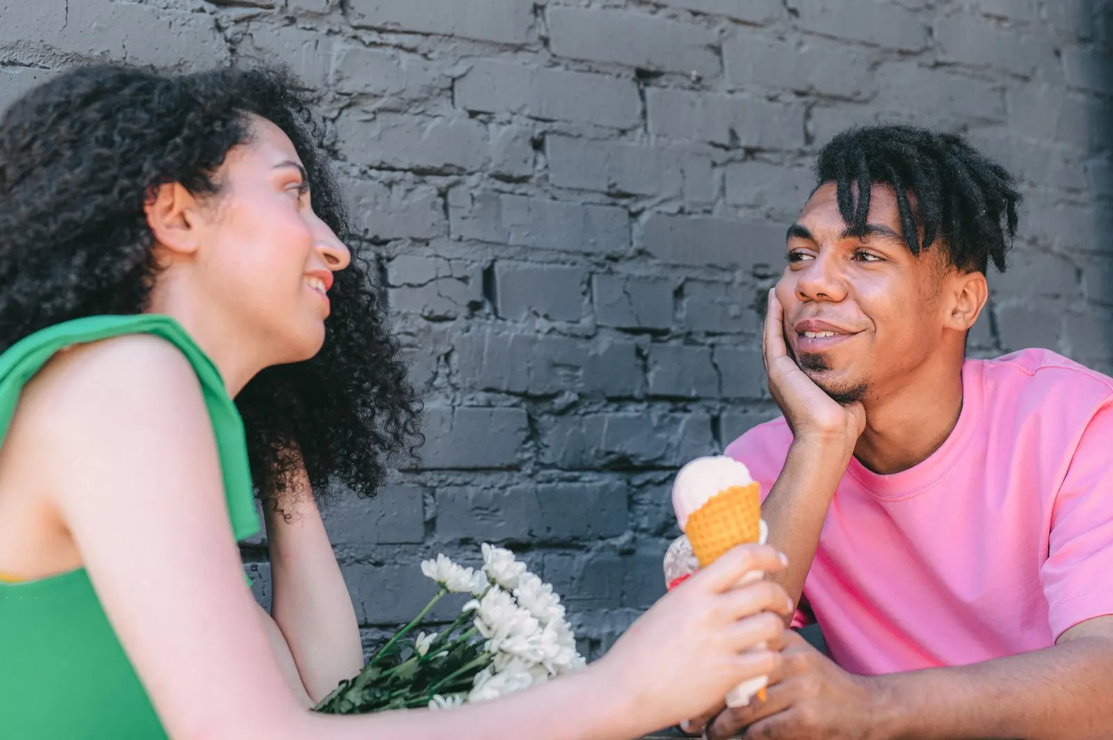 Two people talking while one person reads the emotional tone of the conversation