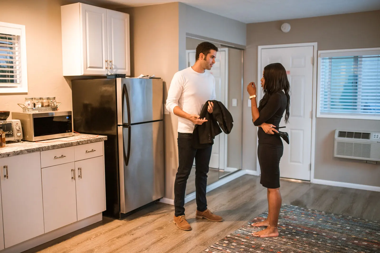 Why Is My Boyfriend So Mean to Me? Signs and What to Do: two partners having a serious boundary conversation at home